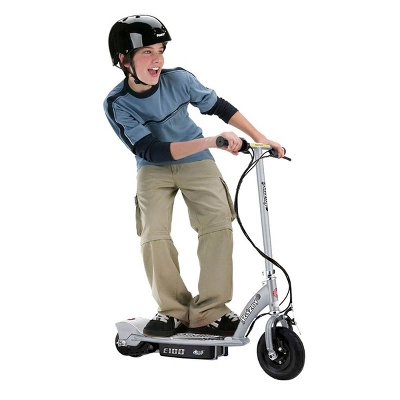 Razor E100 Kids Ride On 24V Motorized Powered Electric Scooter Toy, Speeds Up To 10 MPH With Brakes And 8-Inch Pneumatic Tires, Ages 8 And Up, Silver 1 Razor E100 Kids Ride On 24V Motorized Powered Electric Scooter Toy, Speeds Up To 10 MPH With Brakes And 8-Inch Pneumatic Tires, Ages 8 And Up, Silver