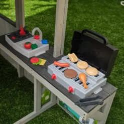 KidKraft Patio Party Wooden Outdoor Playhouse With Spinner Block Puzzle - 14pc -LITTLE TIKES Shop GUEST 89f815b8 fedd 4c0c ac33 85c97ceddc5d