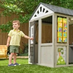 KidKraft Patio Party Wooden Outdoor Playhouse With Spinner Block Puzzle - 14pc -LITTLE TIKES Shop GUEST b1e2c445 a1bf 4dcb 9a2f 3f6719ef9662