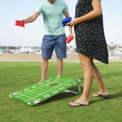 GoSports Portable PVC Framed Cornhole Toss Game Set With 8 Bean Bags And Travel Carrying Case - Choose American Flag Design, Red & Blue Or Football
